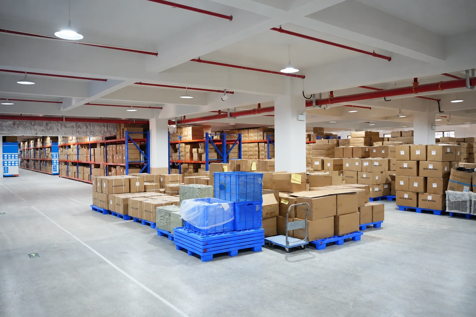 Cartons arranged on pallets in a factory storage area