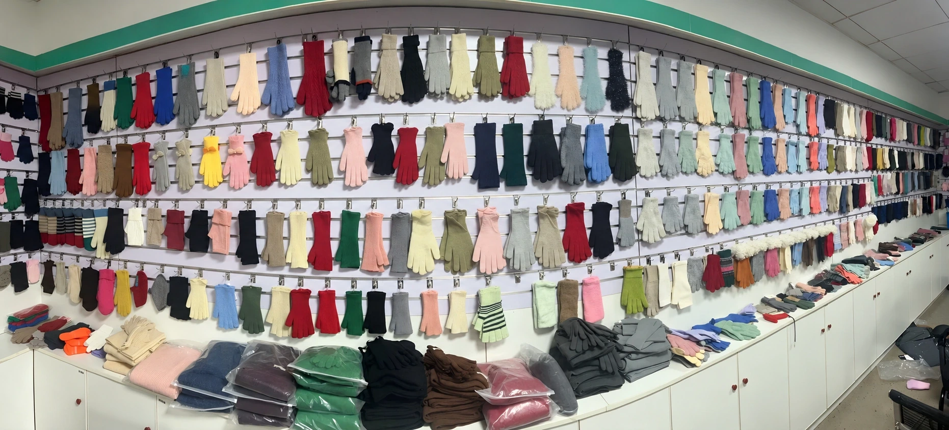 Glove development references displayed across a sample wall